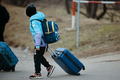 Ukrainian children crossing border into Romania