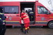 Volunteers from the Romanian Fire Brigade play with baby Lisa *