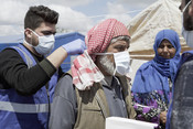 Islamic Relief provide masks, shelter and food items to families in Al-Harakat Camp